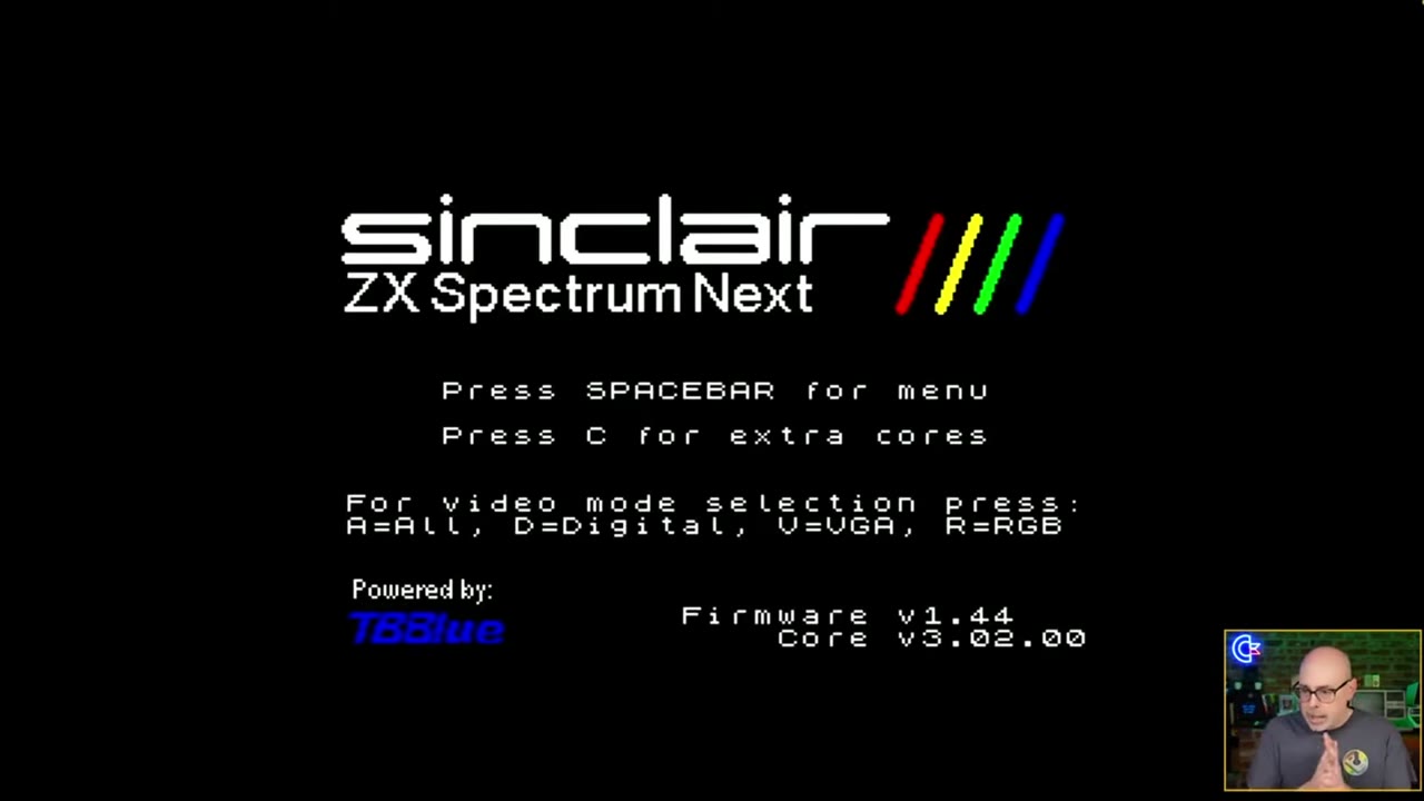 Boot screen showing Firmware v1.44 and Core v3.02.00 with video mode options
