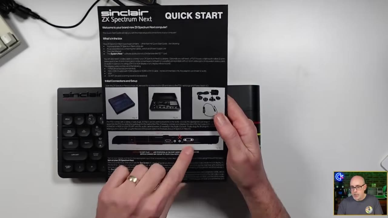 The Quick Start card's diagram of the rear ports