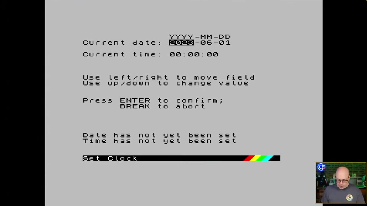 The Set Clock screen with date and time fields